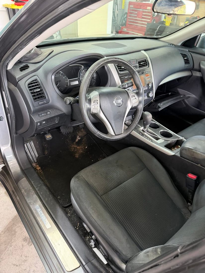 Before interior detail - dirty Nissan Altima interior - Abel Auto Detailing Deltona FL